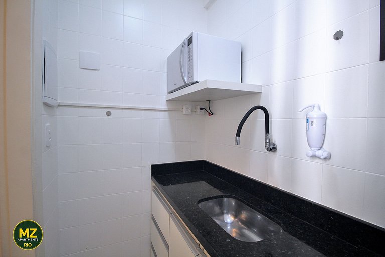 Sala y dormitorio espaciosos y cómodos en Posto 5